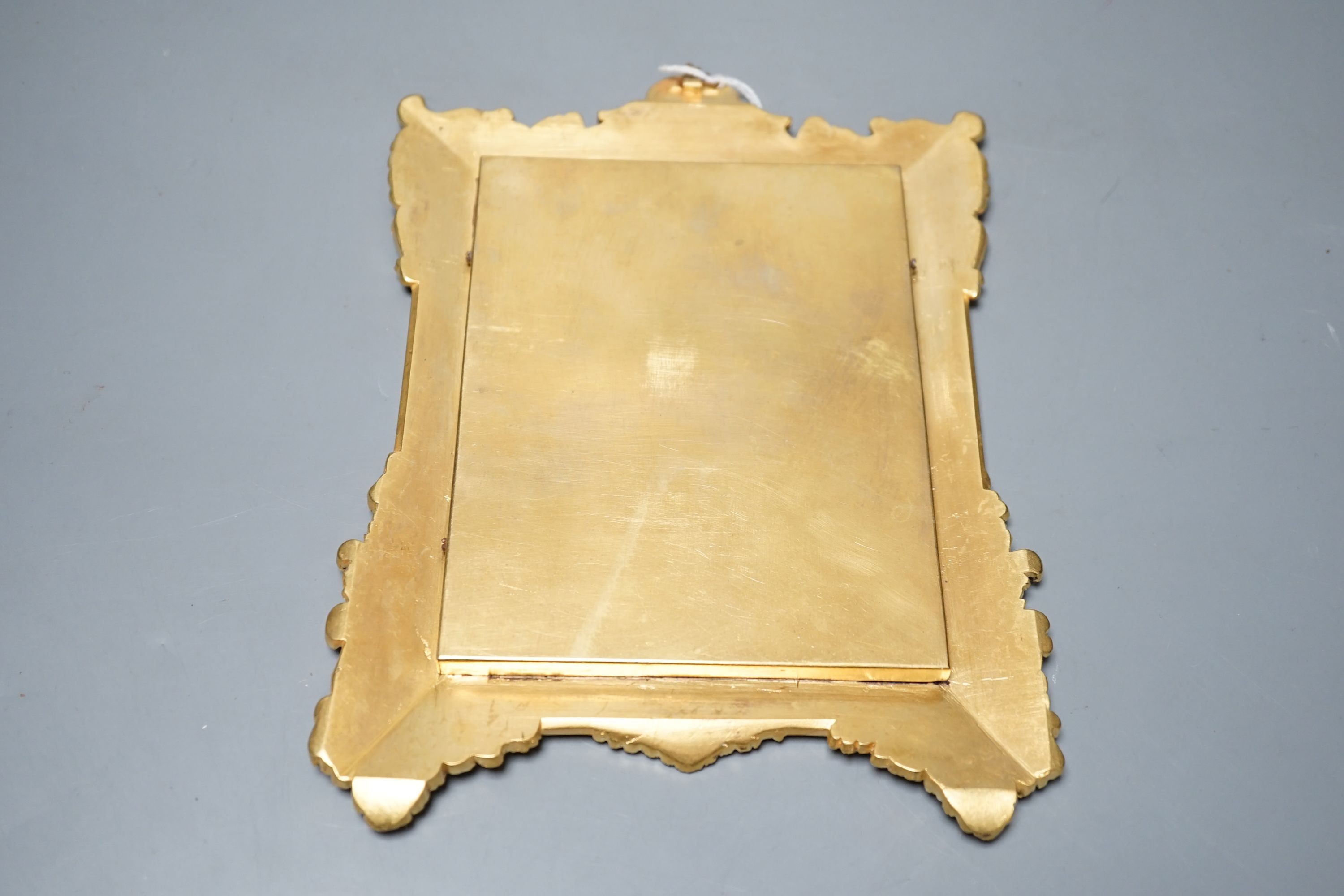 19th century ormolu framed portrait miniature on ivory of a young lady with auburn hair. Length of frame - 23cm